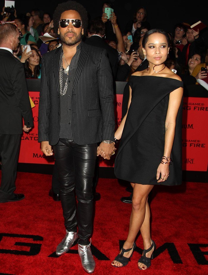 Lenny Kravitz and Zoë Kravitz wear black ensembles on the red carpet of the "Hunger Games: Catching Fire" premiere