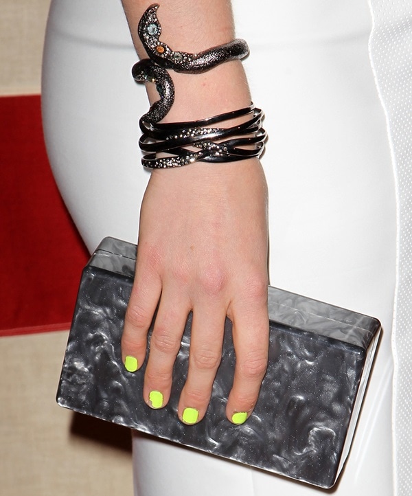 Leven Rambin toted a marbled acrylic Jean box clutch by Edie Parker