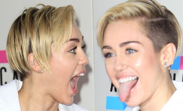Miley Cyrus sticks her tongue out and shows off the shaved side of her head