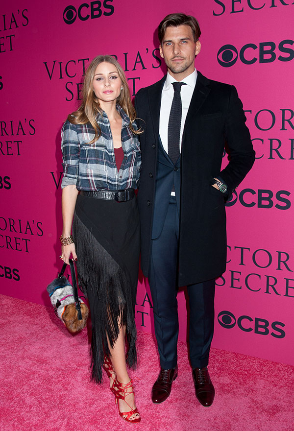 Johannes Huebl and Olivia Palermo pose on the pink carpet of the Victoria's Secret Fashion Show