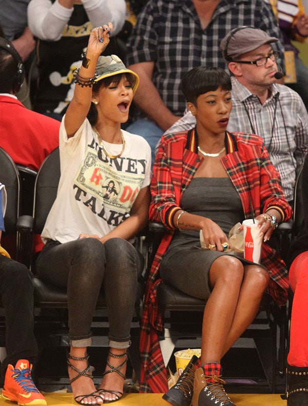 Rihanna and Melissa Forde cheer for the Los Angeles Lakers courtside at the Los Angeles Staples Center
