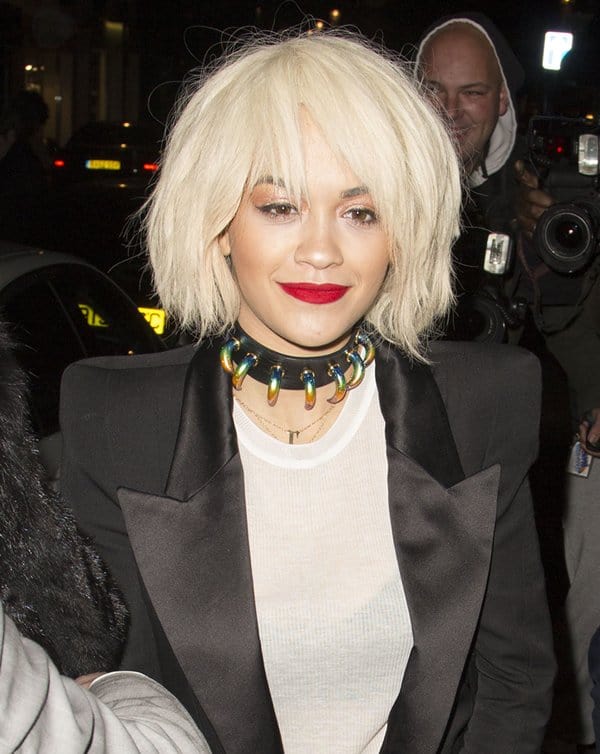 Rita Ora flaunting her eye-catching claw choker from Yoon Ahn's Ambush Design at the birthday celebration