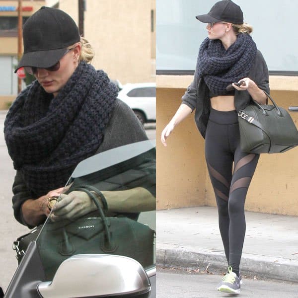 Rosie Huntington-Whiteley showed off her toned stomach while walking to her car after completing a morning workout at the gym