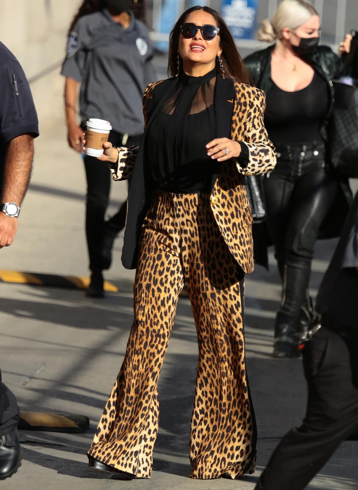 Salma Hayek arrived at the “Jimmy Kimmel Live!” set in Los Angeles on October 14, 2021, in a leopard print Elie Saab Pre-Fall 2021 suit