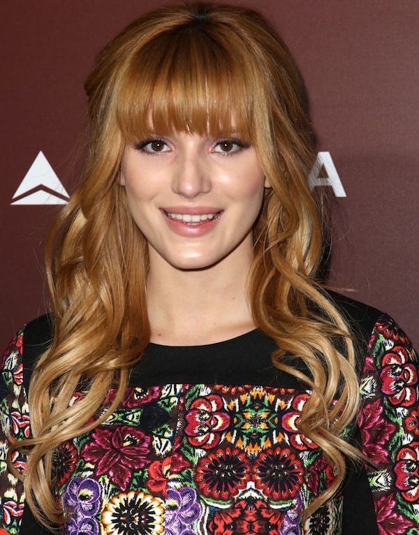 Bella Thorne's golden locks fell in soft waves on her shoulders