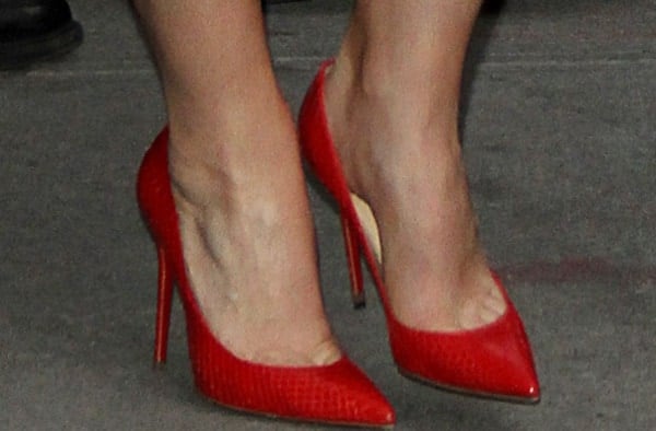 Claire Danes showing off her feet in spicy red pointy-toe pumps