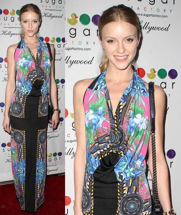 Elle Evans dazzles in a scarf-print dress at the Sugar Factory opening in Hollywood