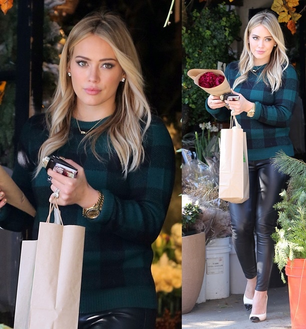 Hilary Duff buying some flowers in a simple but chic outfit punctuated with sky-high cap-toe pumps