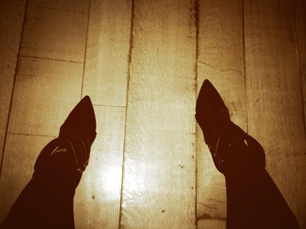 Hilary Duff shares a sepia-toned photo of her Isabel Marant "Tacy" boots on social media, showcasing their pointed-toe design and strappy details