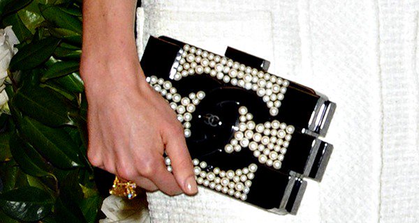 Jessica Biel holds a Lego clutch from Chanel