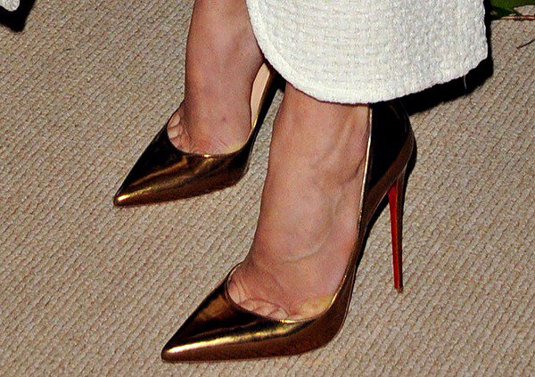 Jessica Biel's feet in bronze Christian Louboutin pumps