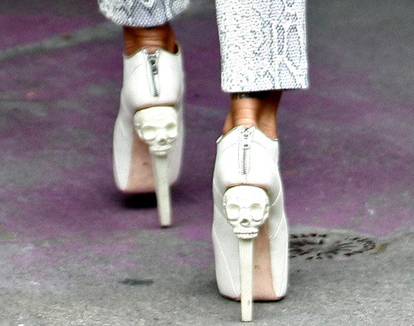 Jodie Marsh wearing towering skull-heeled pumps