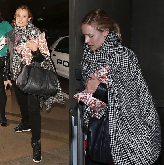 Kristen Bell looks tired after arriving at LAX from a long flight on November 6, 2013
