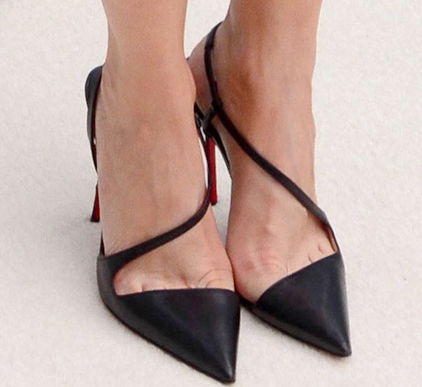 Kristen Wiig's feet in black June slingback pumps
