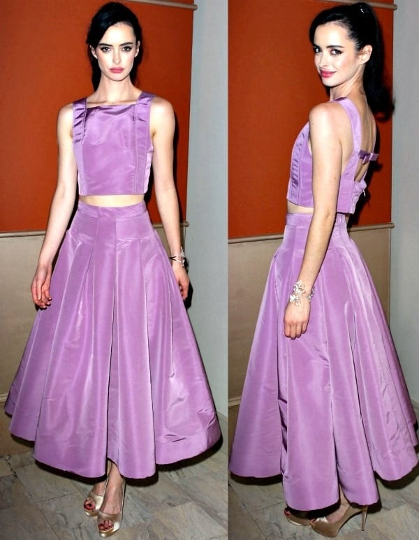Krysten Ritter looked lovely in a Spring 2014 orchid crop top and a retro-style pleated skirt from Katie Ermilio