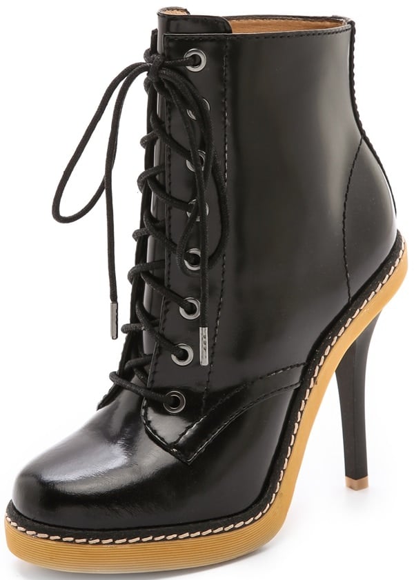 L.A.M.B. offers a sophisticated take on grunge style, crafting leather combat boots with a slim, towering heel