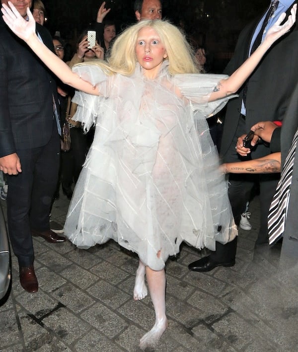 Lady Gaga arrives at her hotel in London, England, wearing a sheer white dress and no shoes