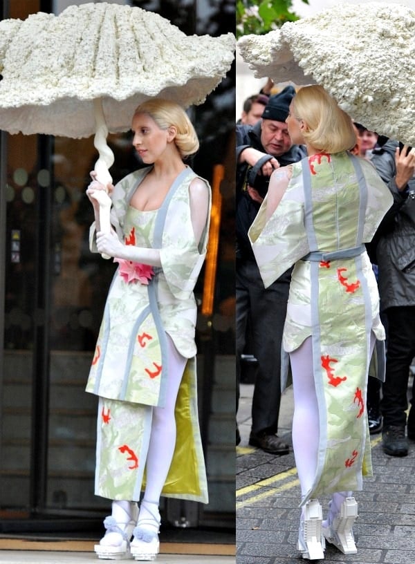 Lady Gaga was spotted leaving her hotel in London dressed as a Japanese geisha in a structured silk dress from Lily Attwood and Spring 2013 white lego heels from Winde Rienstra