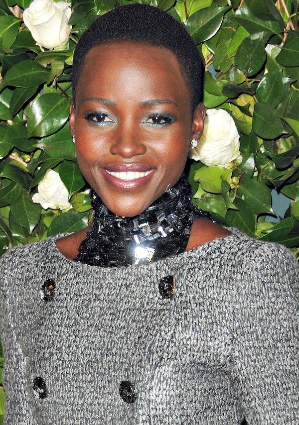 Lupita Nyong'o in a tweed double-breasted jacket