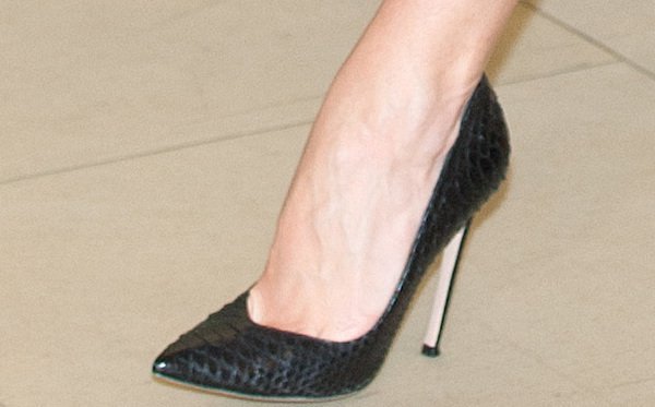 Rosie Huntington-Whiteley exudes elegance in black Gianvito Rossi Edgile pumps, showcasing their sleek pointed-toe silhouette and sophisticated texture