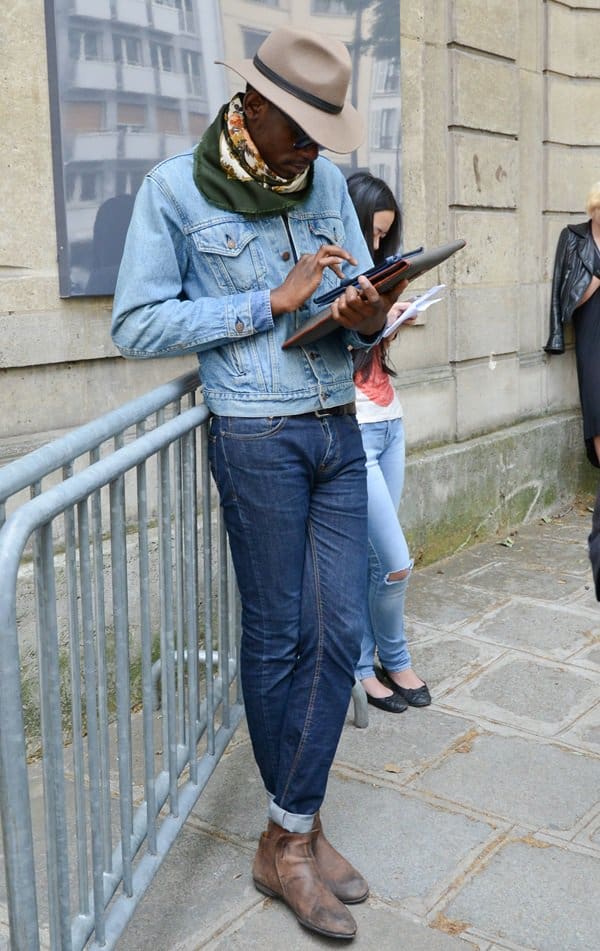 A guest in double denim worn with a silk scarf