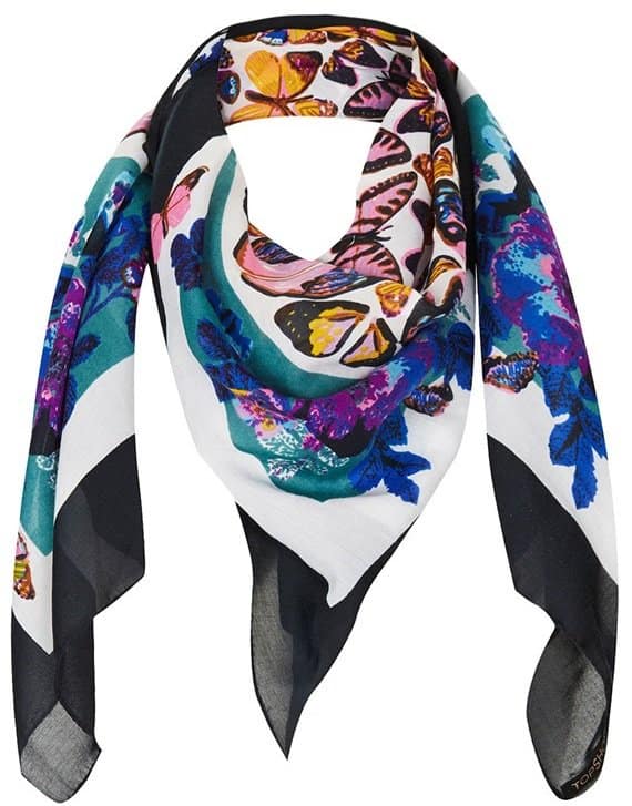 Ethereal butterflies flutter across a wispy square scarf framed in bold contrast borders