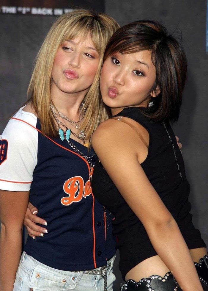 Ashley Tisdale and Brenda Song post for photos at the premiere of the movie Mr. 3000