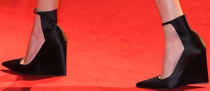 Alexa Chung completed her look with sleek black satin ankle-strap wedges from Burberry Prorsum