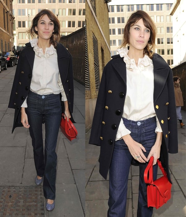 Alexa Chung wore her double-breasted coat over her ruffled top