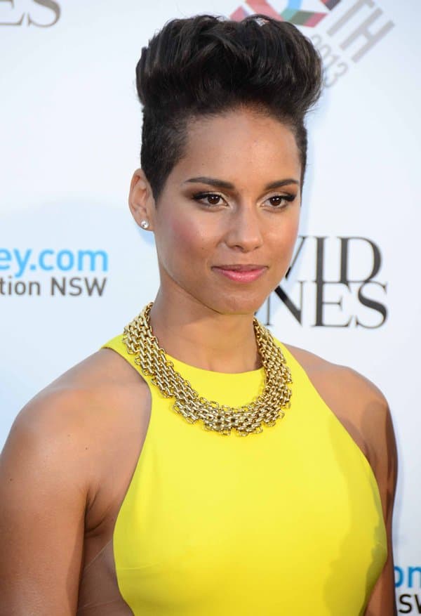 Alicia Keys completed her look with a statement necklace, flawless makeup and a stylish quiffed hairstyle