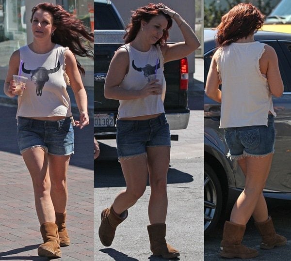 Britney Spears was spotted wearing cutoff denim shorts, a Texas Longhorns tank top and Ugg boots