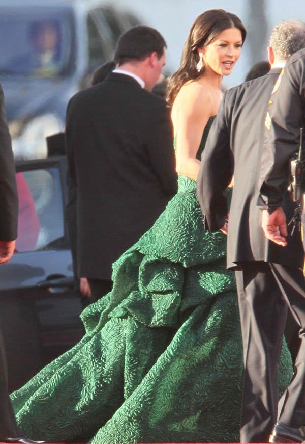 Catherine Zeta-Jones donned a hunter green strapless ball gown from Monique Lhuillier Pre-Fall 2011 Collection
