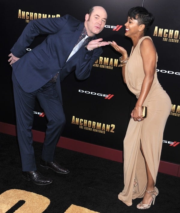 David Koechner and Meagan Good pose for silly photos at the premiere of Anchorman 2: The Legend Continues