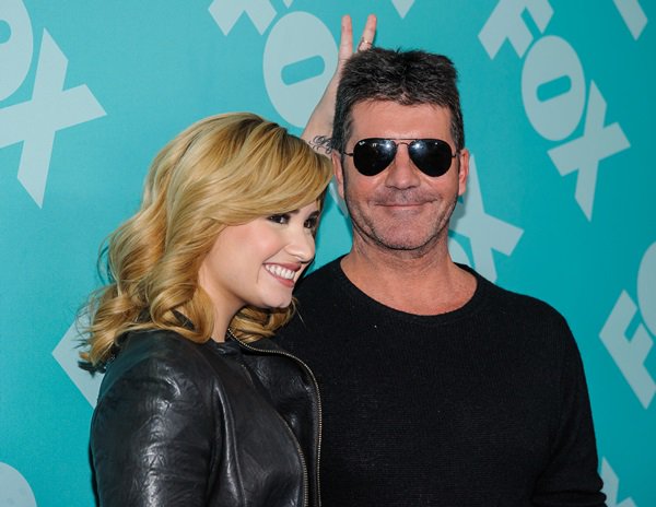 FOX Demi Lovato and Simon Cowell at the FOX 2013 Upfront Presentation post-party at Wollman Rink in Central Park, New York City, on May 13, 2013