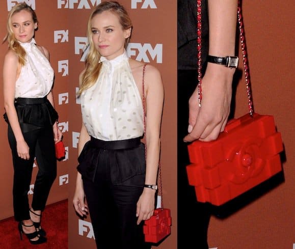Diane Kruger stuns in a chic polka-dot blouse and high-waisted trousers, accessorized with a bold red Chanel Lego clutch at the 2013 FX Upfront Presentation in New York City