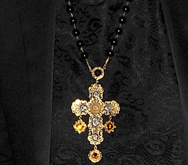 Rita Ora wearing a Dolce & Gabbana 'Sicilian' filigree rosary necklace