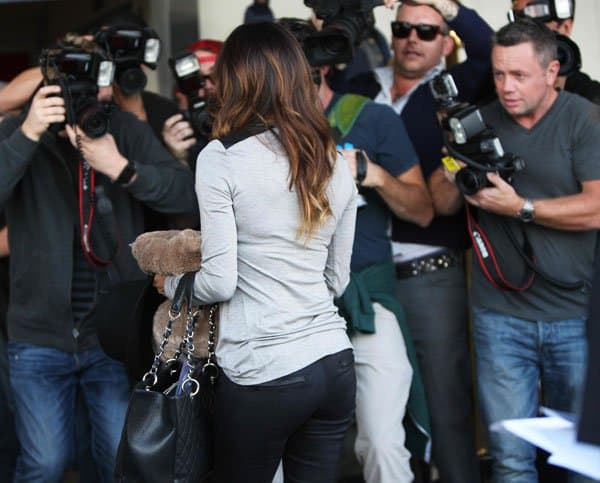 Eva Longoria emerging from the Ken Paves Salon and leaving for LAX