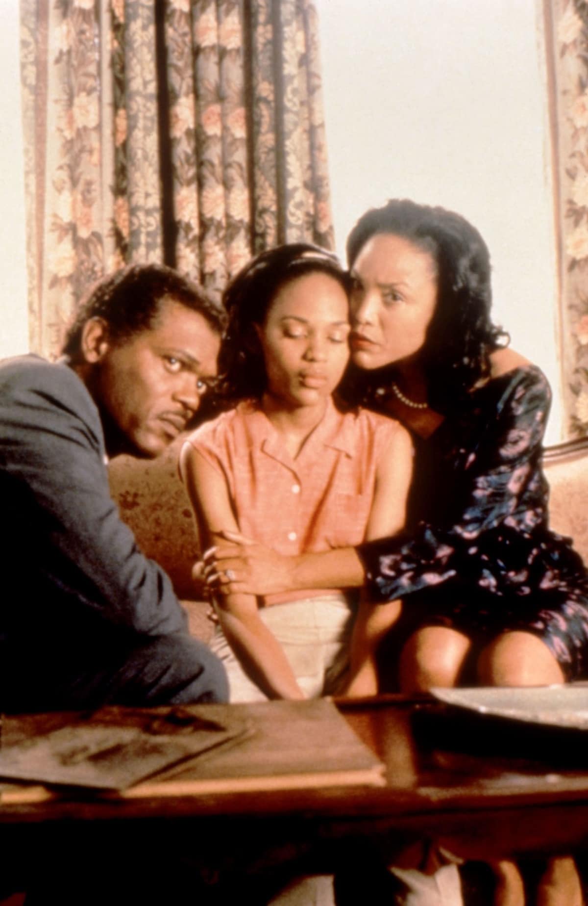 Samuel L. Jackson as Louis Batiste, Lynn Whitfield as Roz Batiste, and Meagan Good as Cisely Batiste in the 1997 American Southern Gothic drama film Eve's Bayou