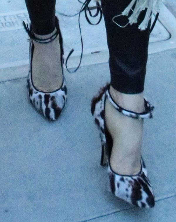 Fergie's feet in jaguar-print Christopher Kane pumps