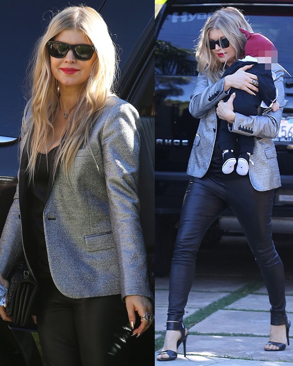Fergie wears a silver tuxedo jacket and leather pants