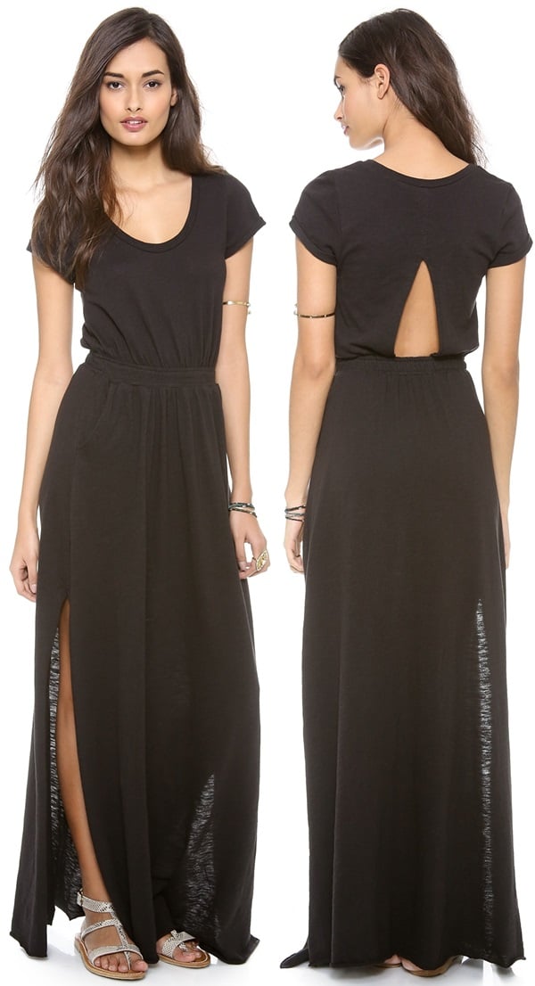 A casual knit black dress gains flattering definition from a gathered elastic waist