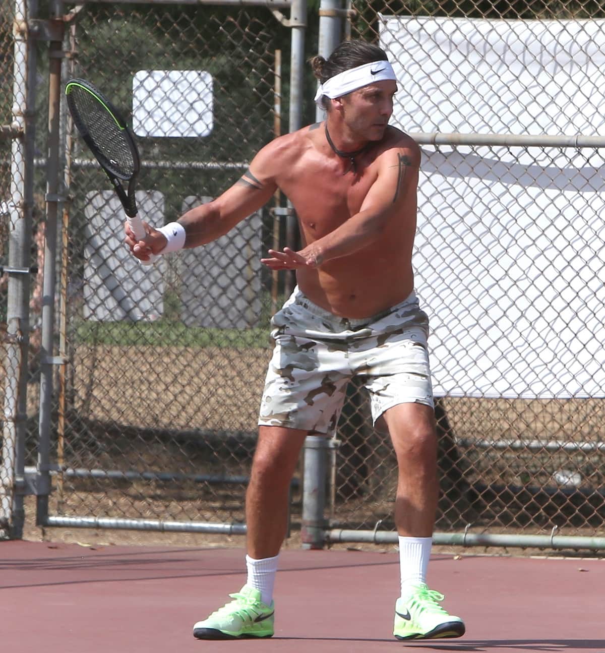 Gwen Stefani's ex-husband Gavin Rossdale goes shirtless as he plays tennis in Los Angeles