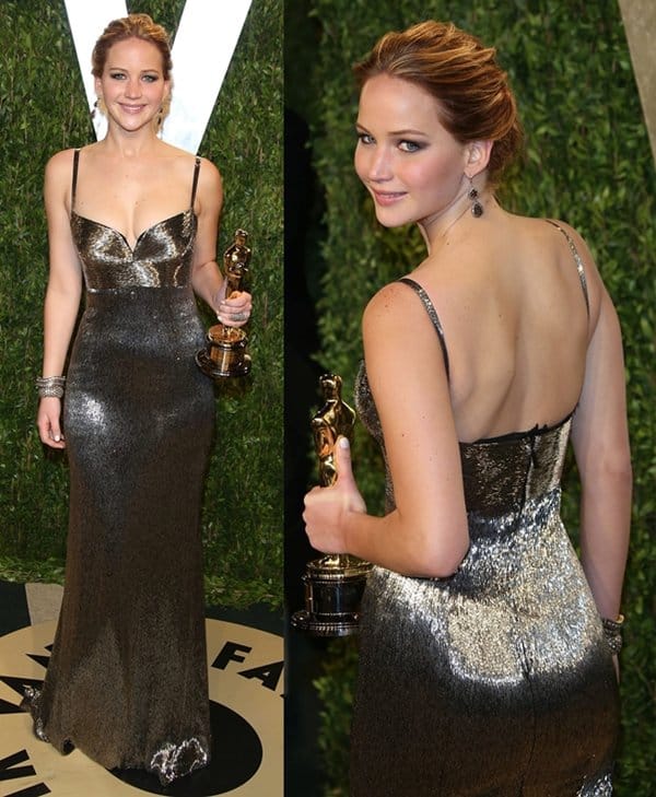 Jennifer Lawrence arrives at the Vanity Fair Oscar Party in a dazzling Calvin Klein dress