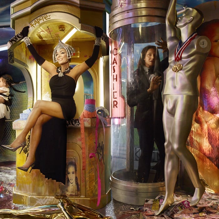 Bruce Jenner appears trapped behind Kris Jenner inside a glass tube in the 2013 Kardashian Christmas Card