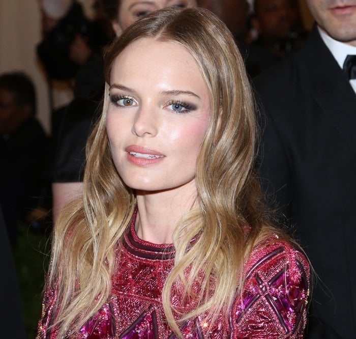 Kate Bosworth curls her blonde hair for the 2013 Met Gala held May 6 at the Metropolitan Museum of Art in New York City