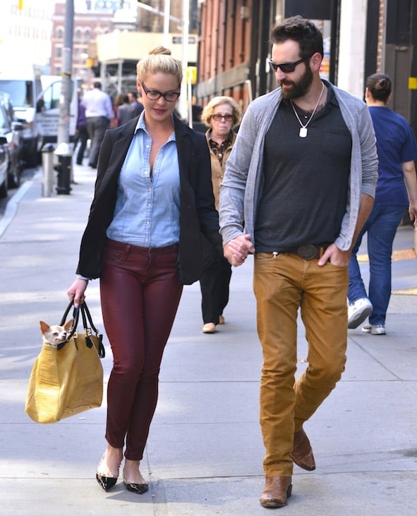 Katherine Heigl keeps it polished in a blazer and burgundy leather pants, carrying her Chihuahua in a chic Fendi tote while strolling through New York City with husband Josh Kelley on October 4, 2013