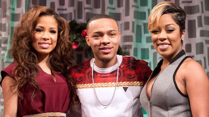 K. Michelle (R) visits BET's "106 & Park" with hosts Keshia Chante (L) and Bow Wow (c) at BET Studios on December 19, 2013, in New York City