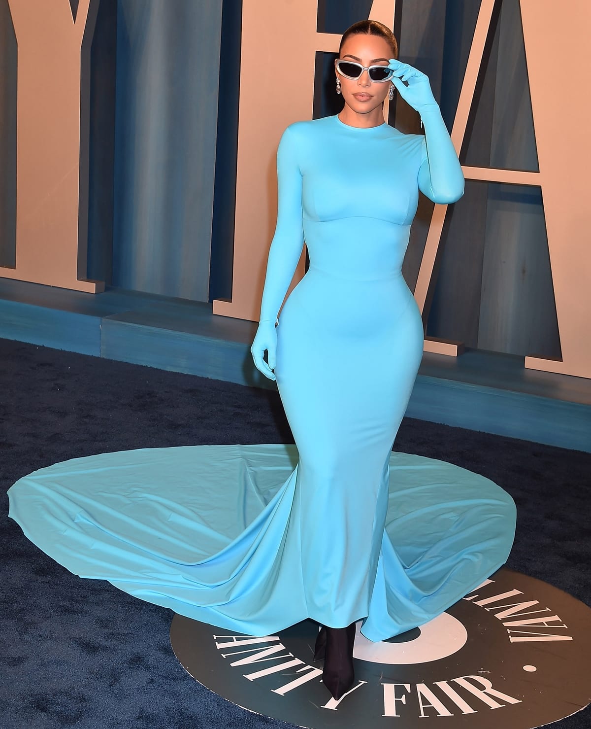 Kim Kardashian in a blue Balenciaga Fall 2022 dress at the 2022 Vanity Fair After-Oscars Party