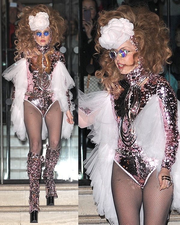 Lady Gaga wears a sparkling sequined leotard and a huge curled wig in chestnut