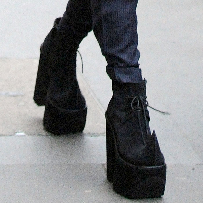 Lady Gaga wearing horn toe platform boots